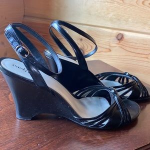 Black wedge heeled sandals